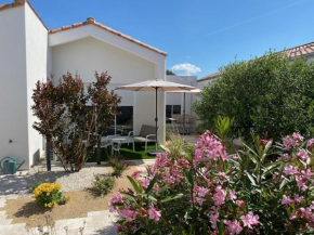 Maison neuve zone coulée verte menant a l'océan